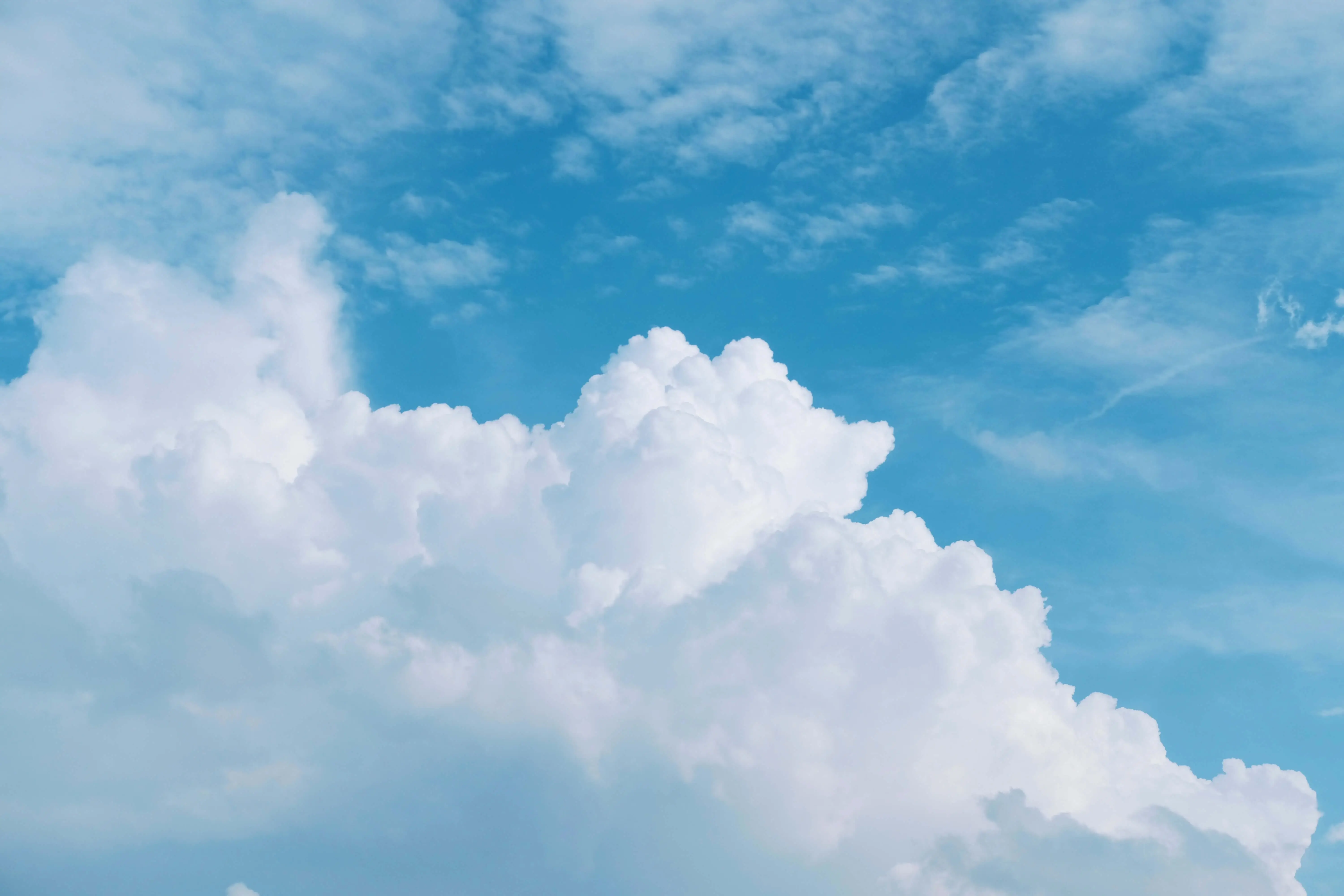 clouds on in a light blue sky